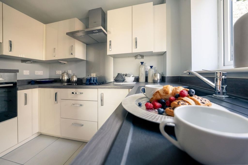 Property photo 1 of 11 Typical Kitchen