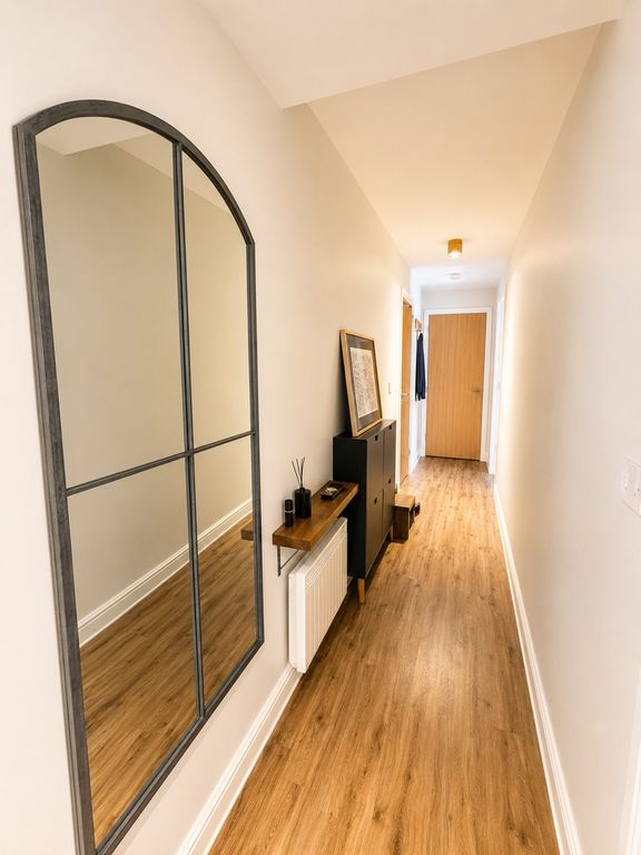 Property photo 2 of 9 Bright Modern Hallway With Stylish Arched Mirror...