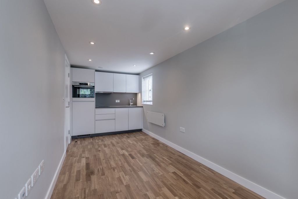 Property photo 3 of 12 Kitchen