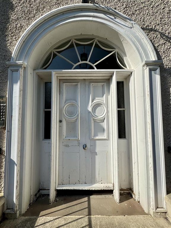 Property photo 3 of 14 Front Door To Apartments