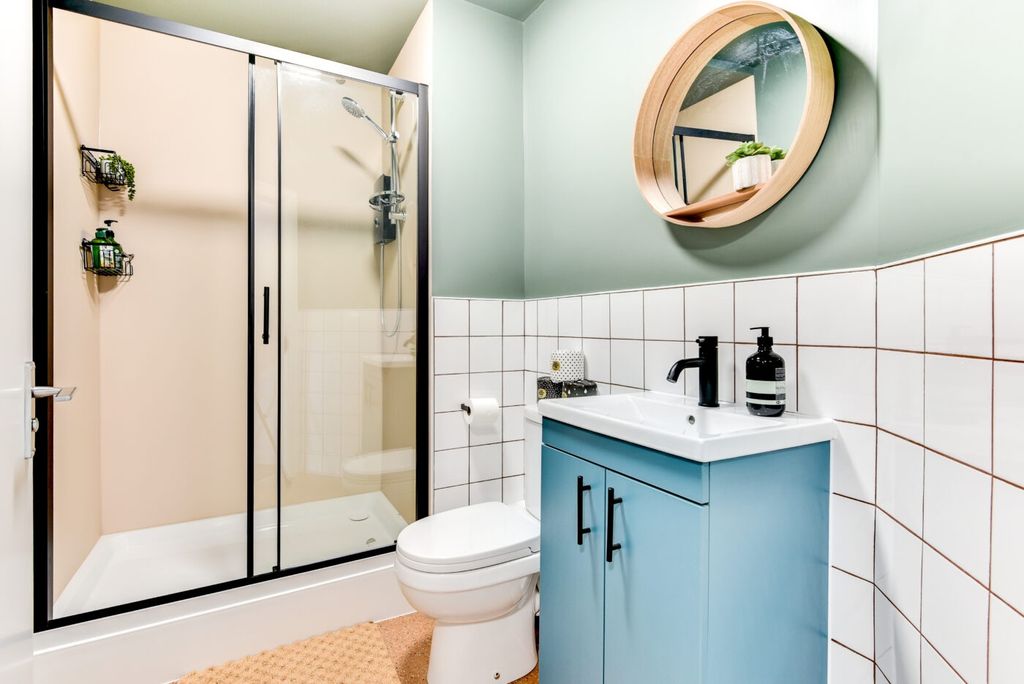 Property photo 2 of 6 Bright, Modern Bathroom With A Walk-In Shower, Con...