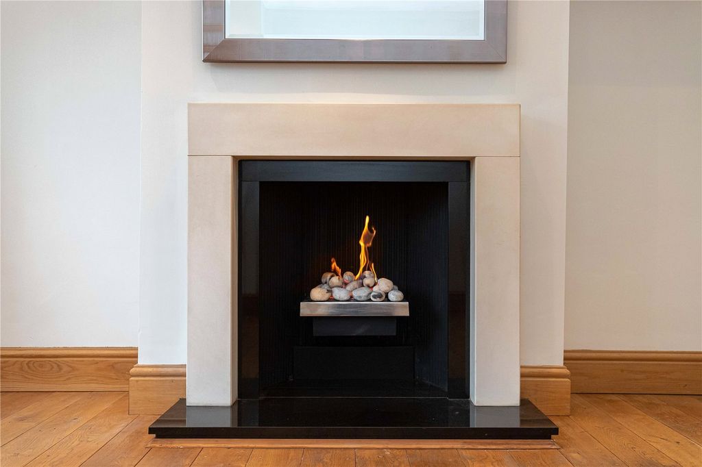 Property photo 3 of 13 Cosy Fireplace
