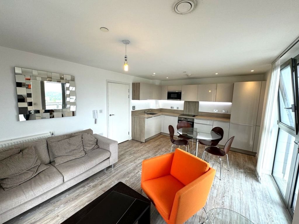 Property photo 2 of 6 Living Area