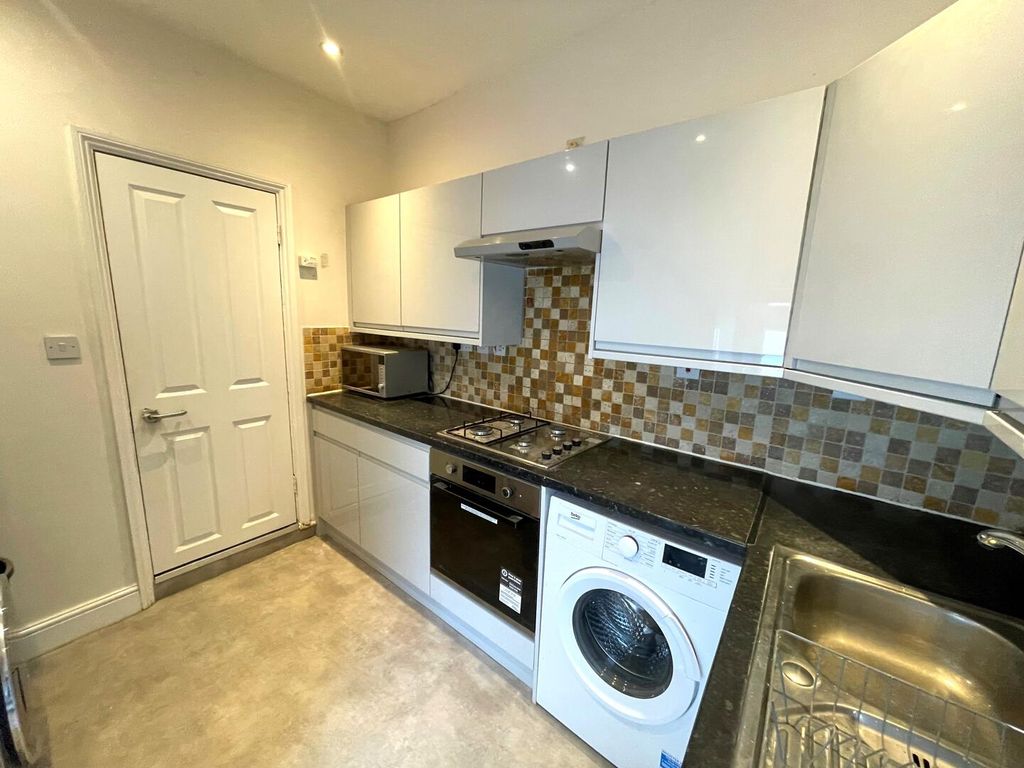 Property photo 3 of 13 Kitchen