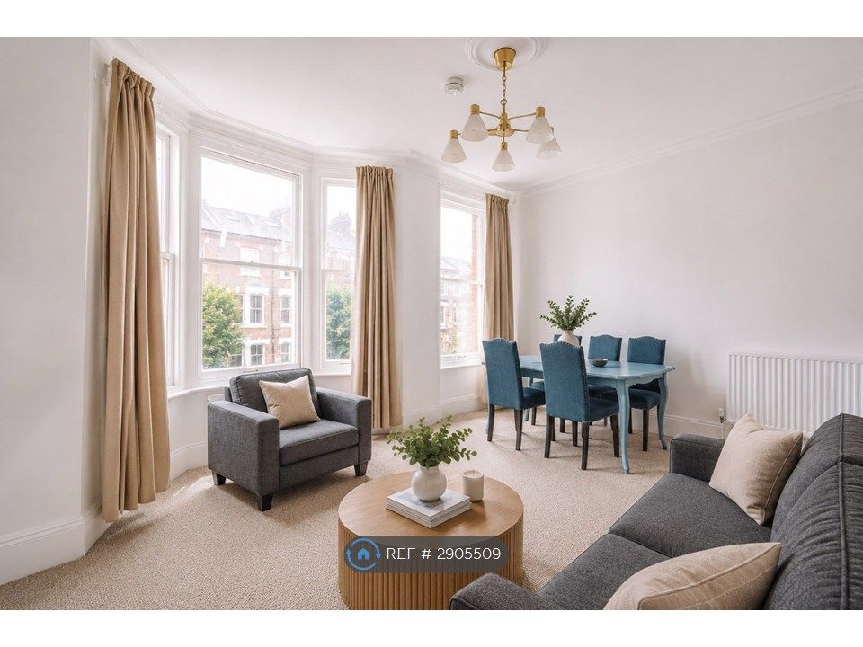 Property photo 1 of 12 Living Room Dining Area