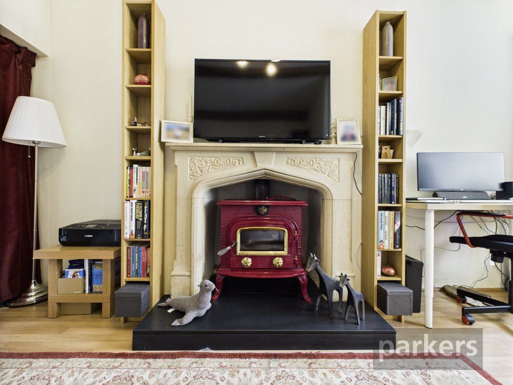 Property photo 2 of 12 Fireplace