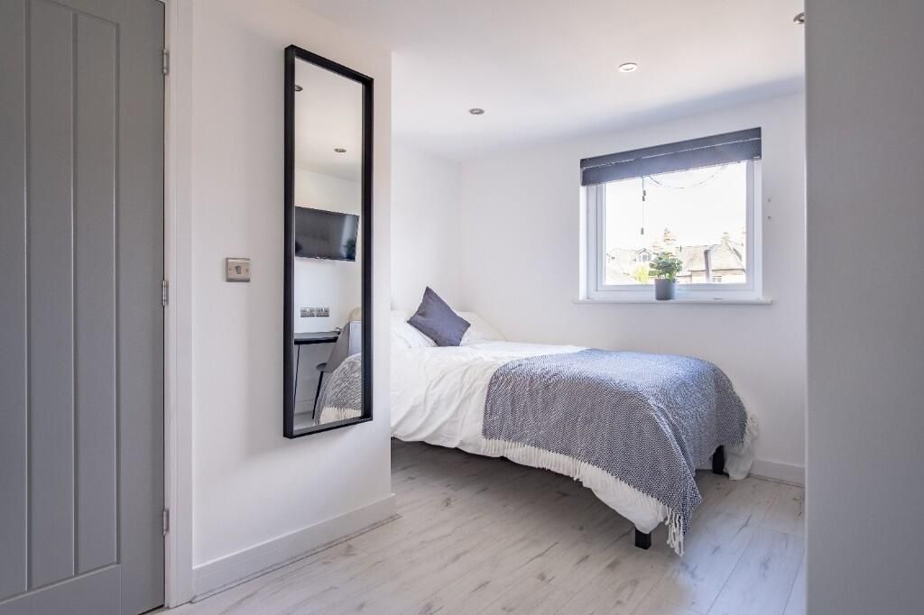 Property photo 3 of 12 A Bright And Inviting Double Bedroom Featuring A c...