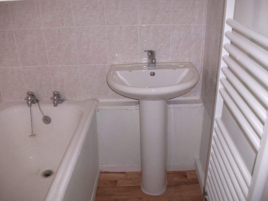 Property photo 2 of 8 A Tidy Bathroom Featuring A Bath And Sink, Perfect...