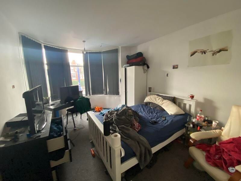 Property photo 1 of 10 A Spacious Master Bedroom Featuring A Large Bed, A...