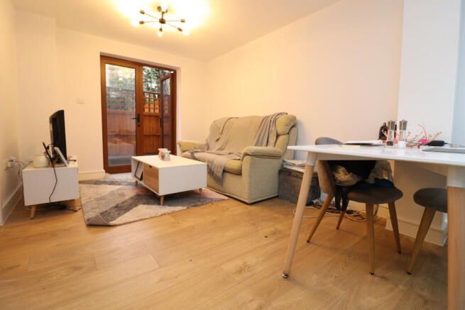 Property photo 3 of 8 Living Area