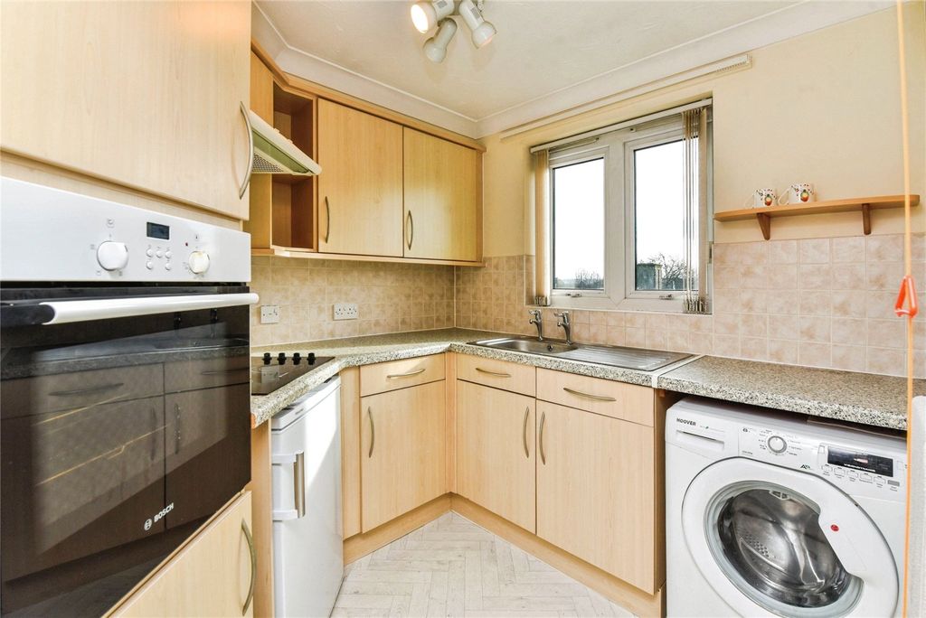 Property photo 3 of 12 Kitchen