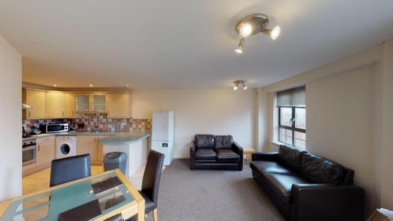 Property photo 2 of 6 A Cozy And Well-Maintained Living Room Featuring A...