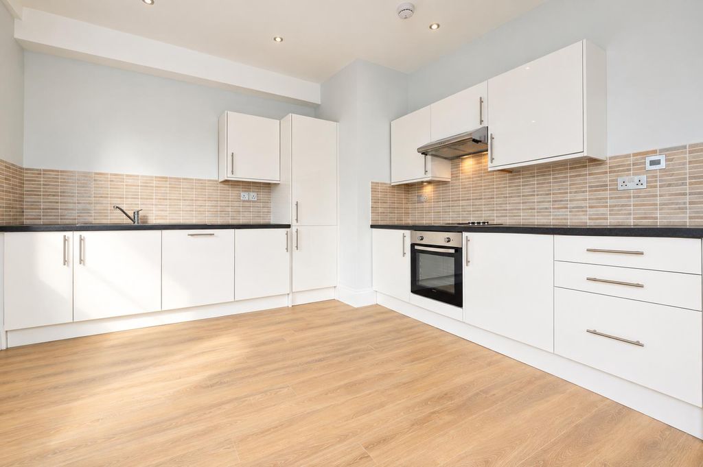 Property photo 2 of 10 Modern Minimalist Kitchen Interior.Png