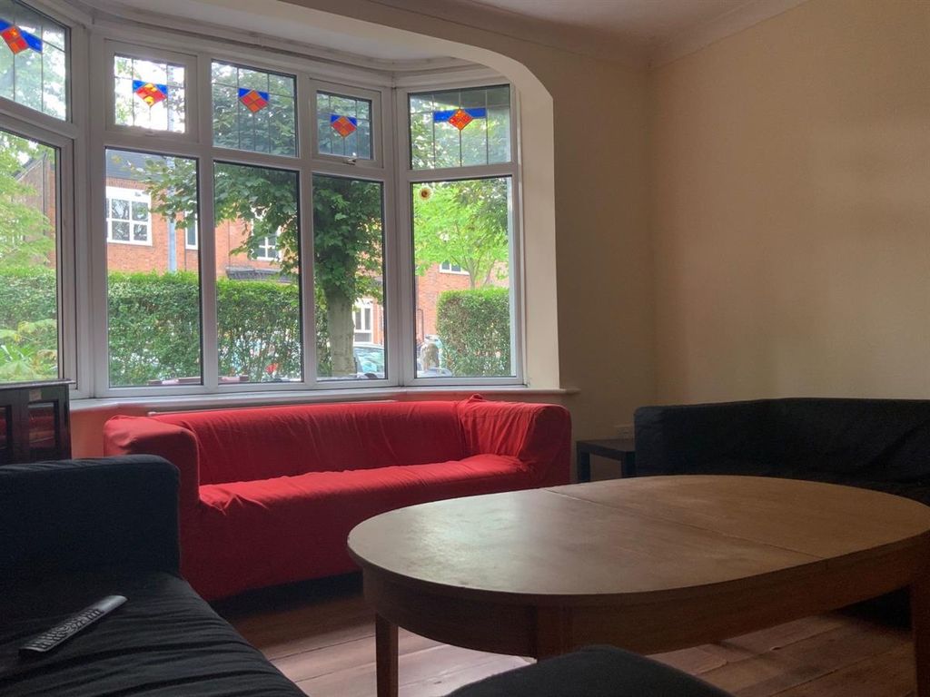 Property photo 2 of 14 A Cozy Living Room With A Large Window Allowing Na...