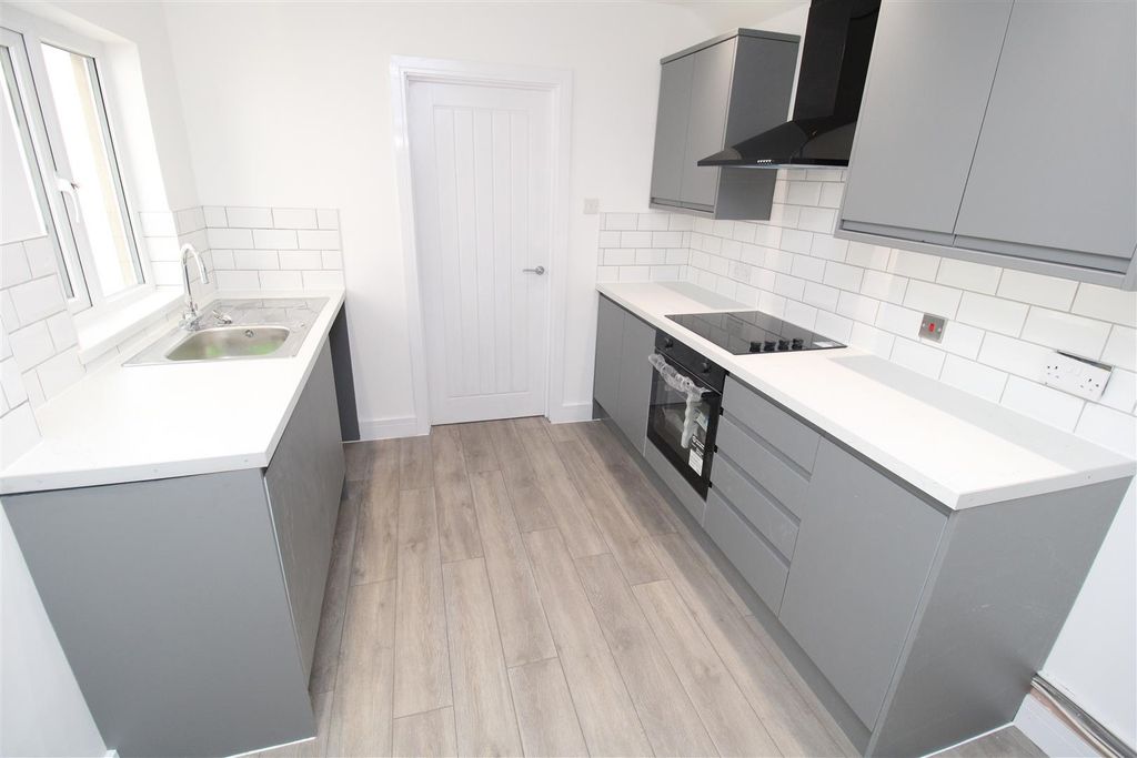 Property photo 1 of 11 Modern Kitchen With Sleek Grey Units...