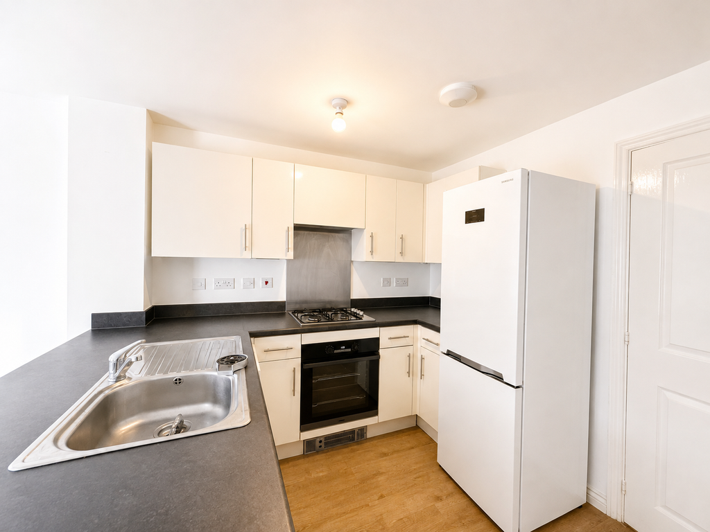 Property photo 2 of 9 Kitchen Area