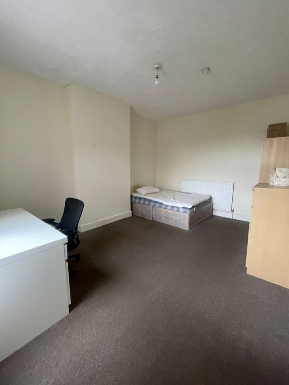 Property photo 2 of 8 A Modest Single Bedroom Featuring A Single Bed, A ...