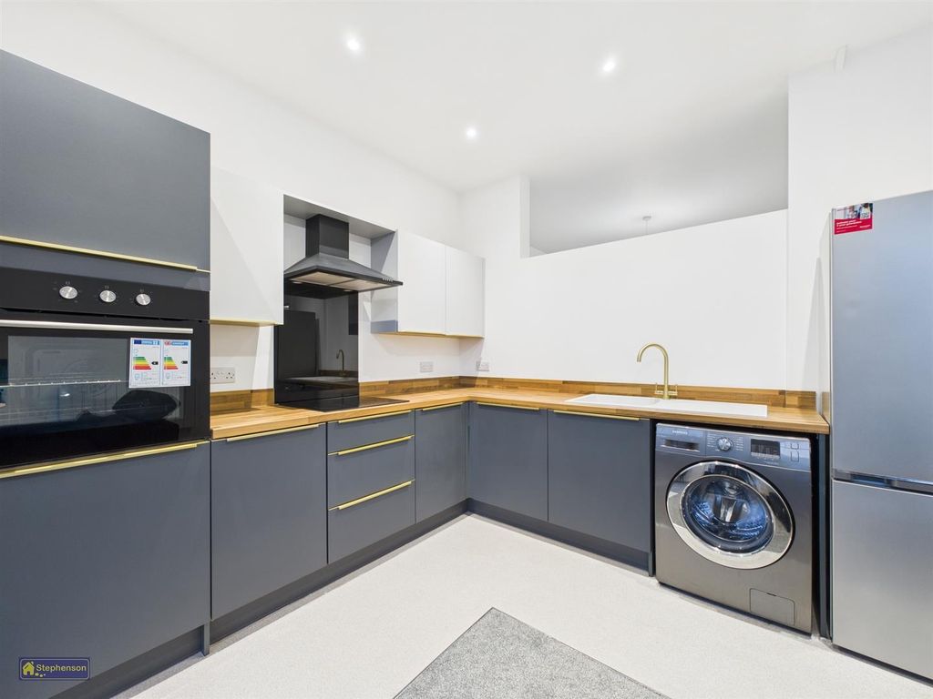 Property photo 2 of 6 Kitchen Area