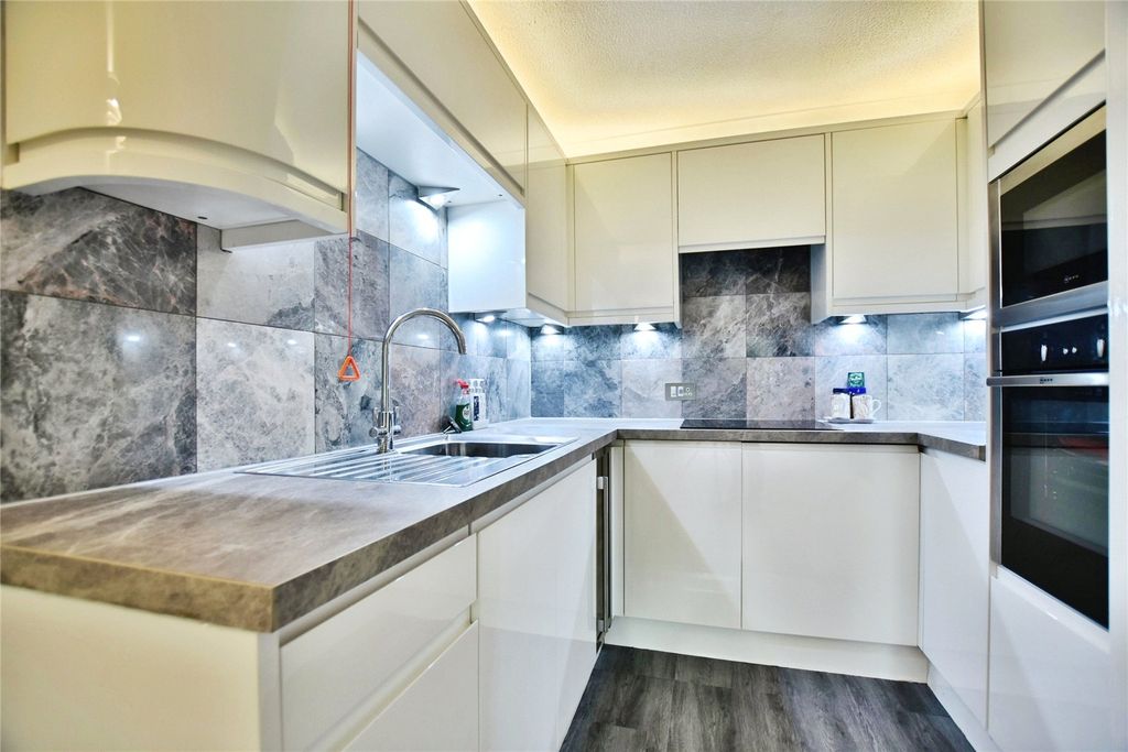 Property photo 3 of 12 Kitchen