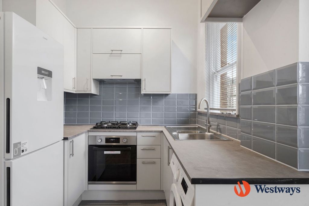 Property photo 3 of 9 Kitchen