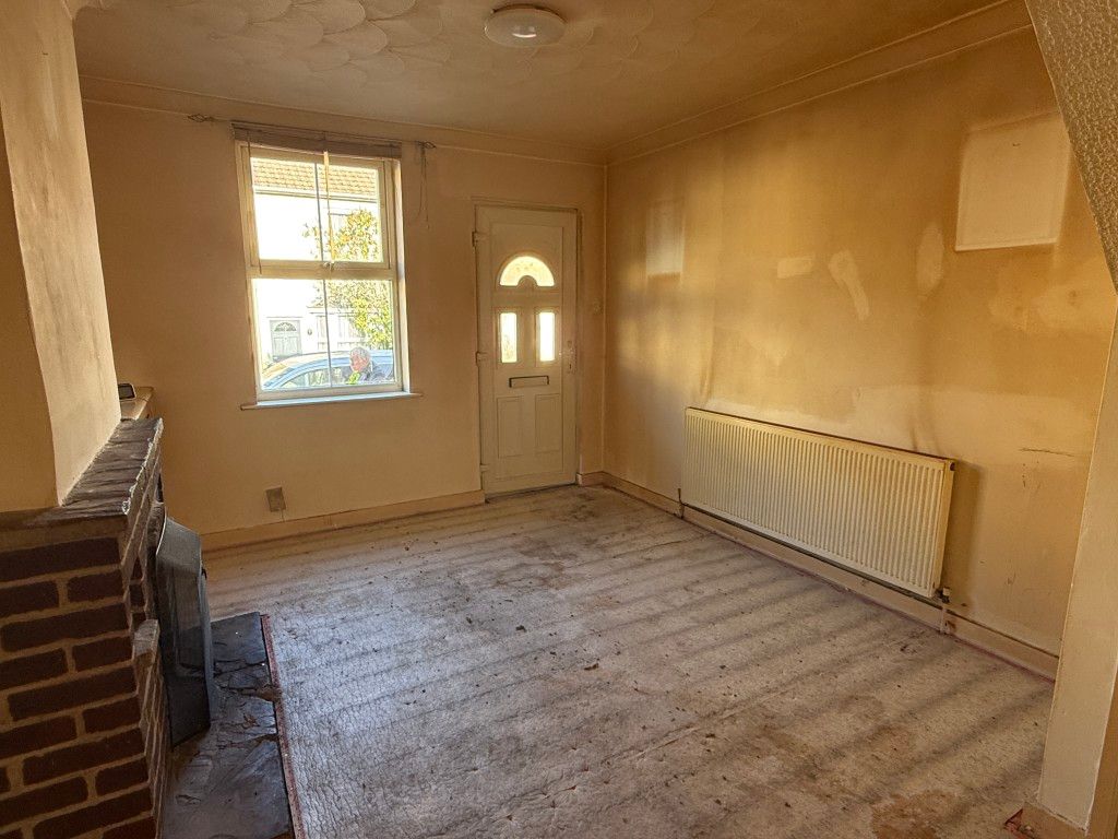 Property photo 2 of 7 Living Room In House In Need Of Refurbishment