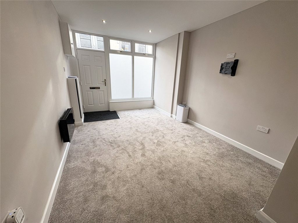 Property photo 2 of 10 Living Area