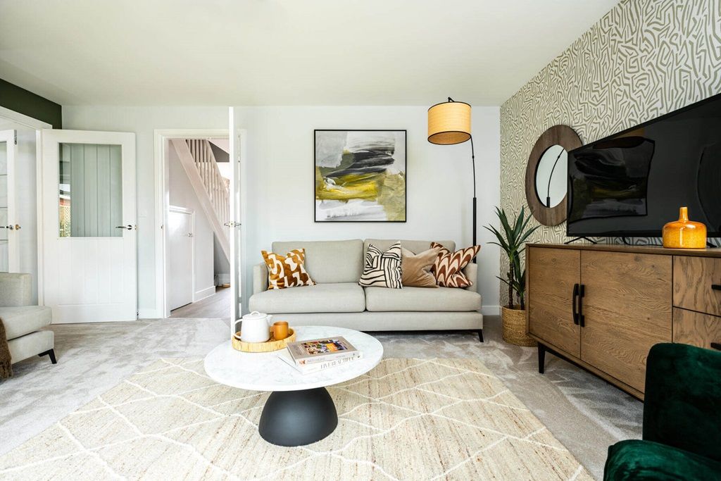 Property photo 3 of 12 A Bright And Open Lounge Is The Perfect Space To Relax With The Family