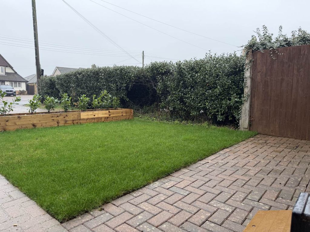 Property photo 3 of 15 Front Lawn