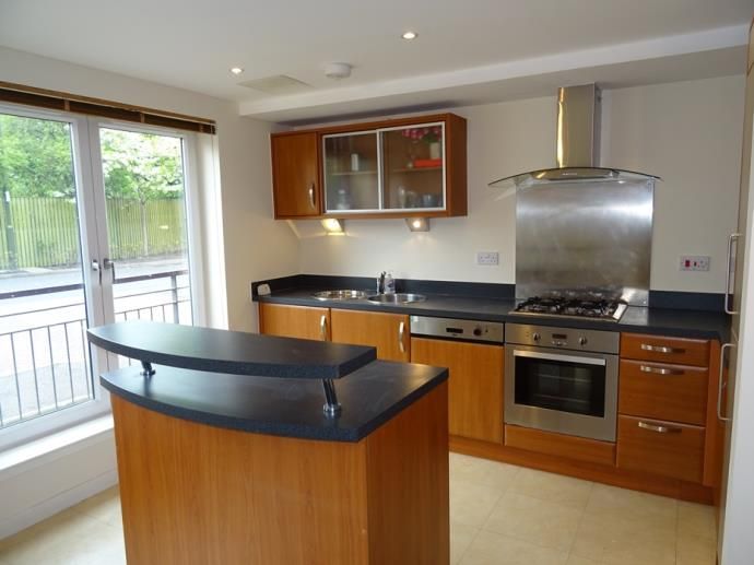 Property photo 3 of 12 Kitchen