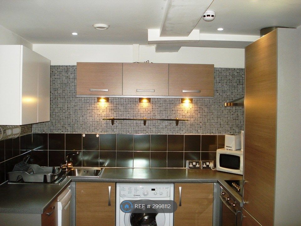 Property photo 2 of 6 Kitchen Area