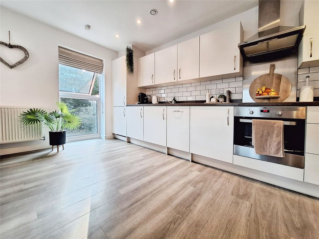 Property photo 2 of 16 Kitchen Area