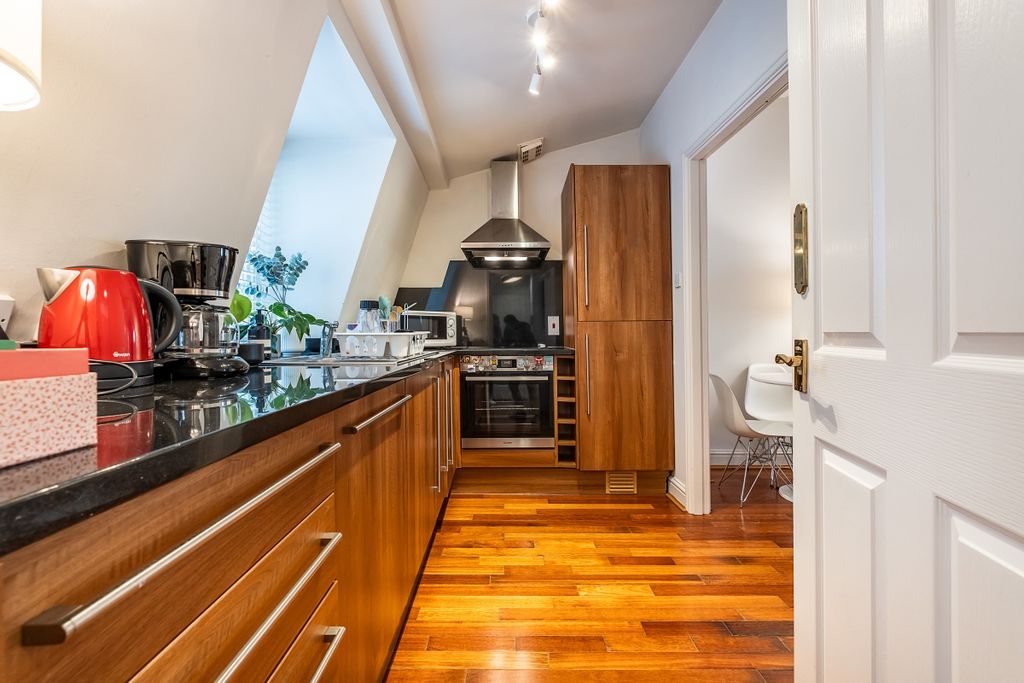 Property photo 3 of 8 Kitchen