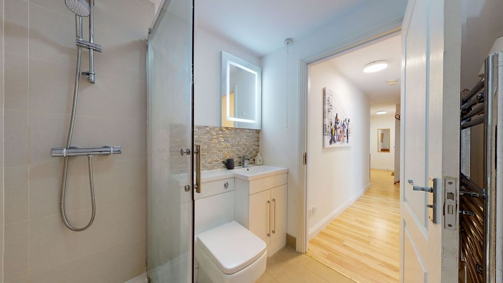 Property photo 3 of 13 Modern Bathroom Featuring A Sleek Shower, A Contem...