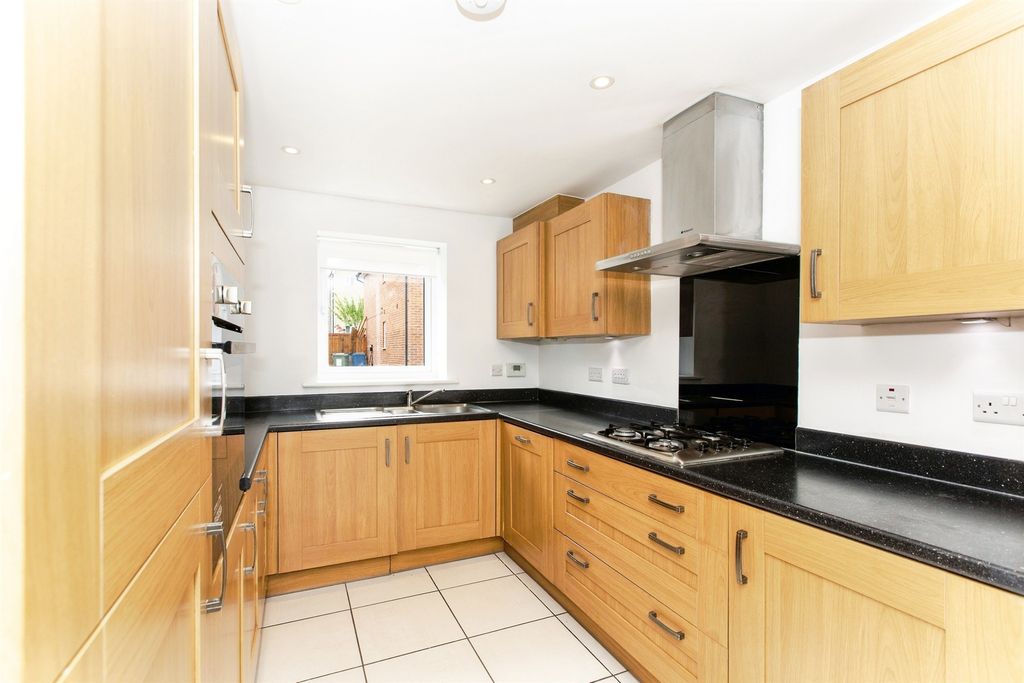Property photo 2 of 12 Kitchen Area