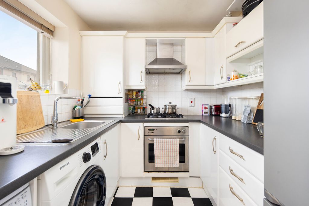 Property photo 3 of 12 Kitchen