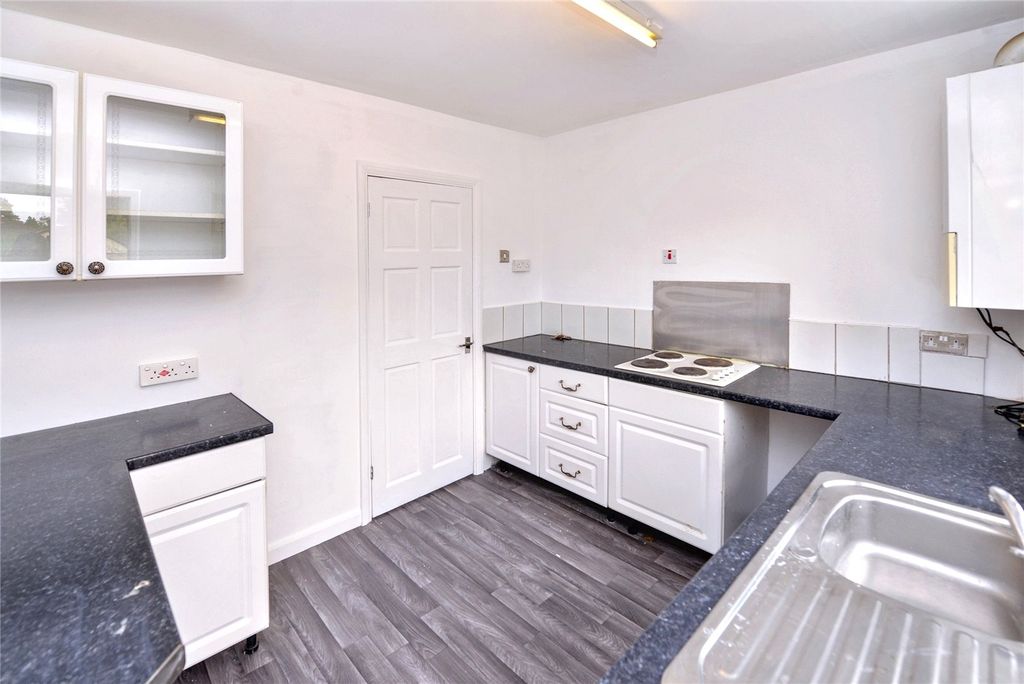 Property photo 3 of 12 Kitchen
