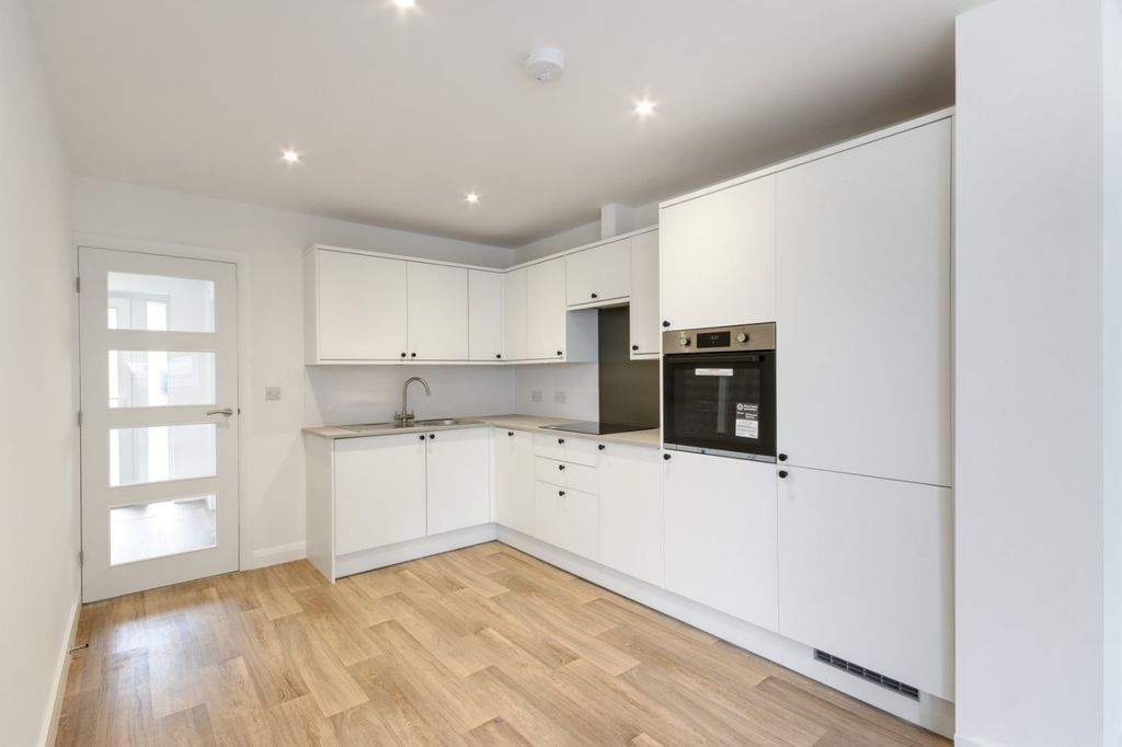 Property photo 2 of 12 Kitchen Area