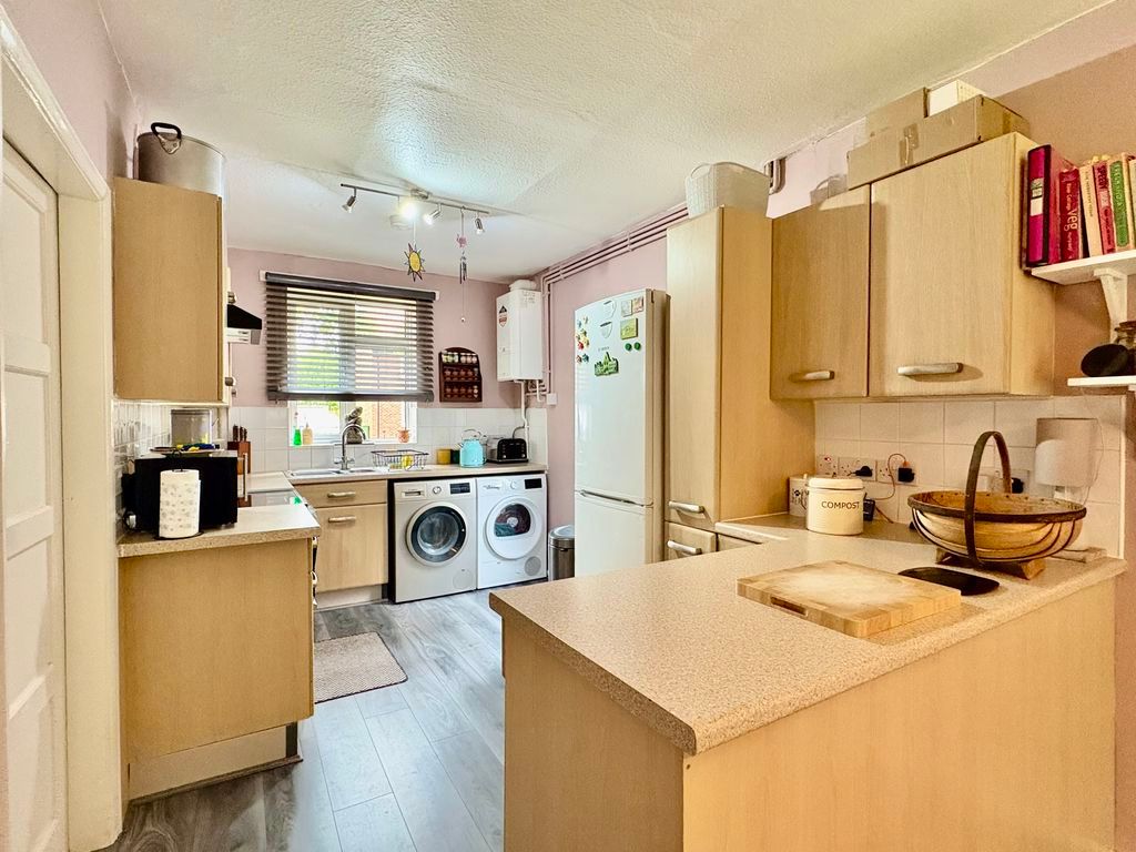 Property photo 2 of 13 Kitchen Area