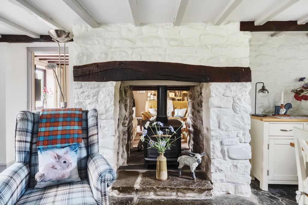 Property photo 3 of 24 Feature Double-Sided Fireplace