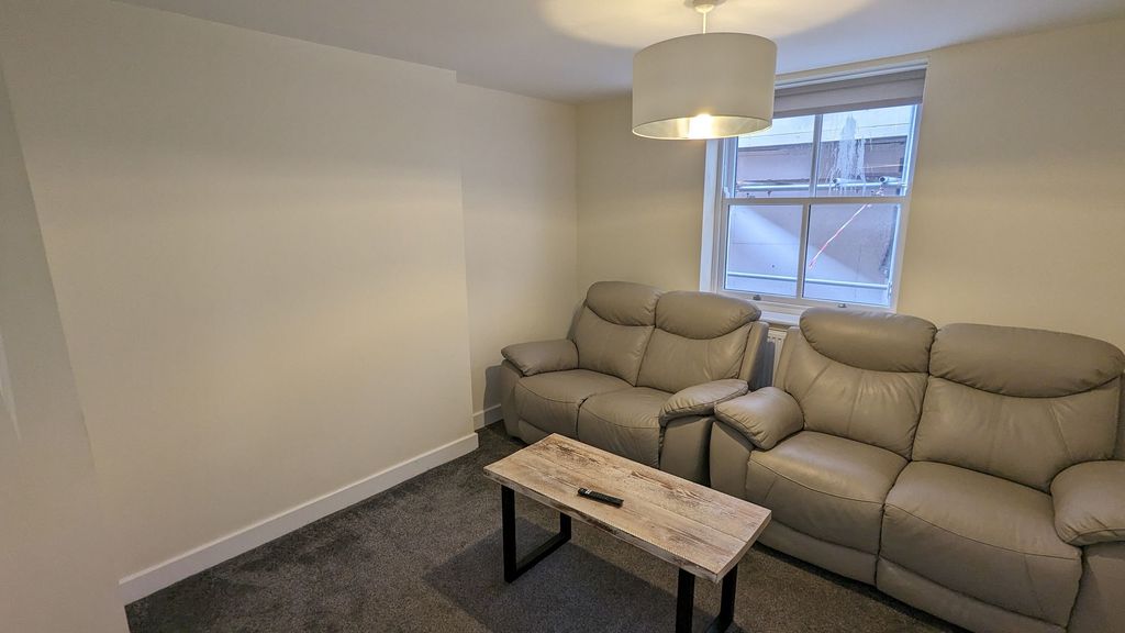 Property photo 1 of 9 Living Area