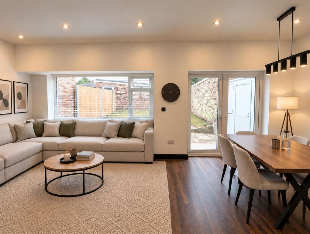Property photo 3 of 17 Living And Dining.Png