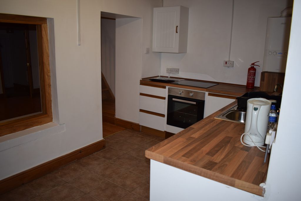 Property photo 3 of 7 Kitchen