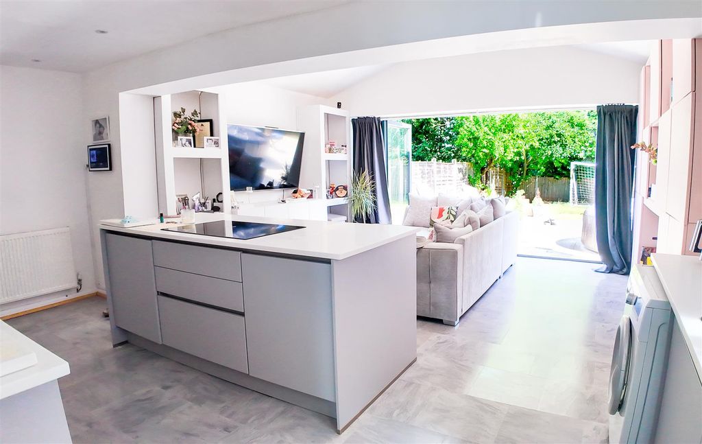 Property photo 2 of 16 Dining Kitchen &amp; Family Room