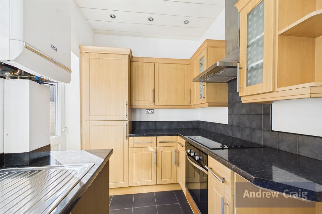 Property photo 3 of 13 Kitchen