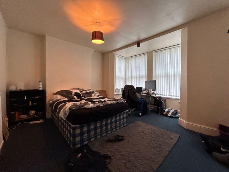 Property photo 3 of 10 A Spacious Bedroom Featuring A Large Double Bed, A...