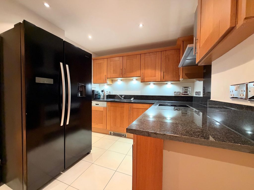 Property photo 3 of 9 Kitchen