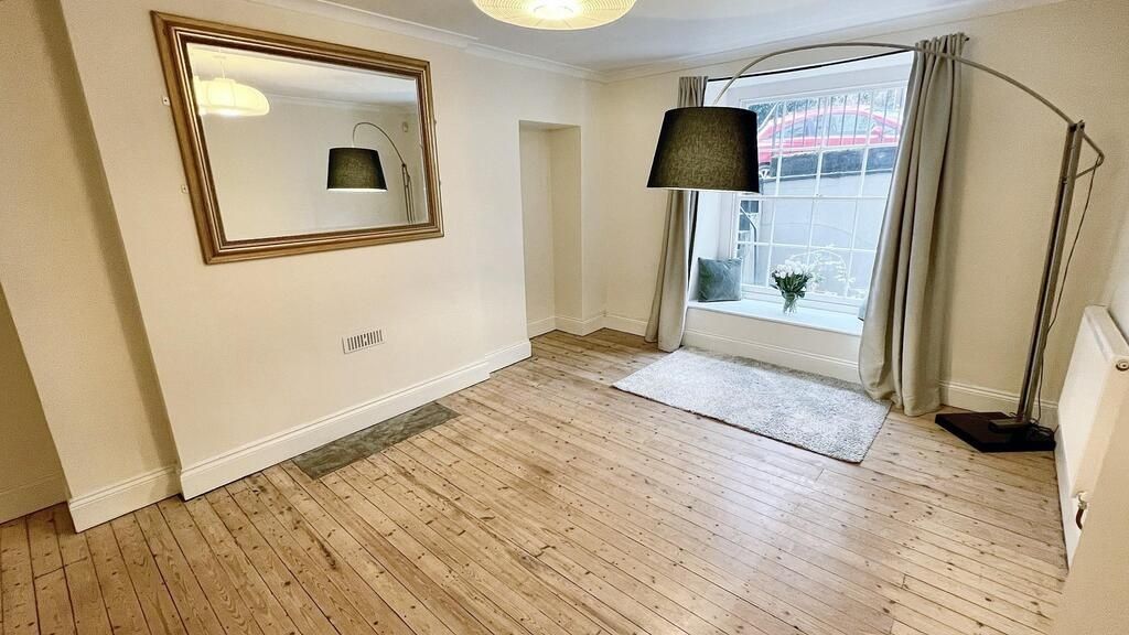 Property photo 3 of 15 Bright Living Room With Large Front Window, Hardwo...