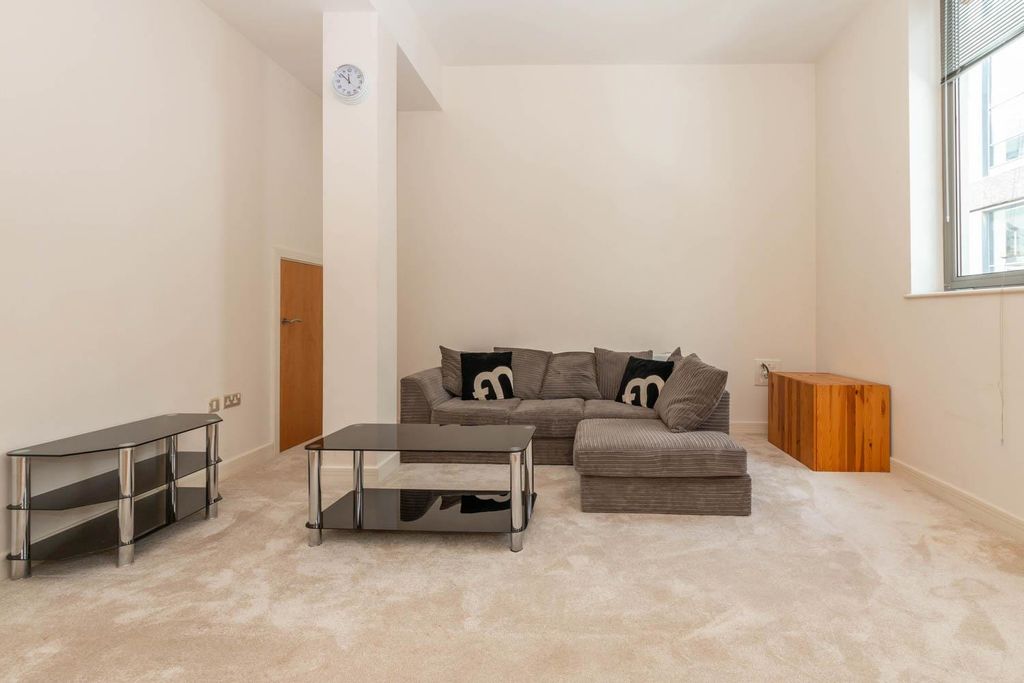 Property photo 2 of 13 Living Area