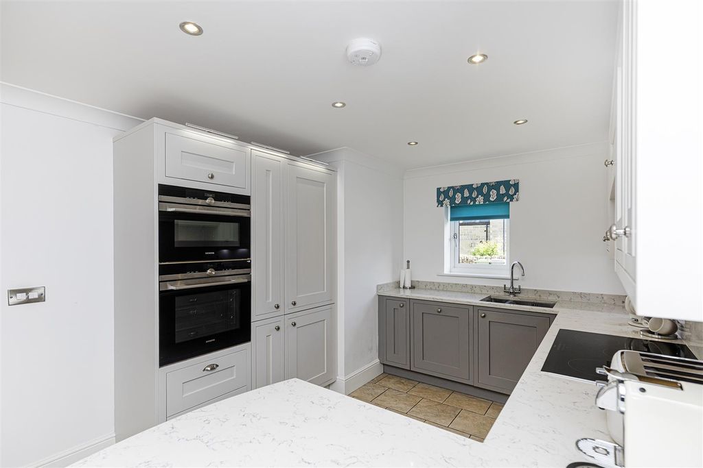 Property photo 2 of 39 Dining Kitchen