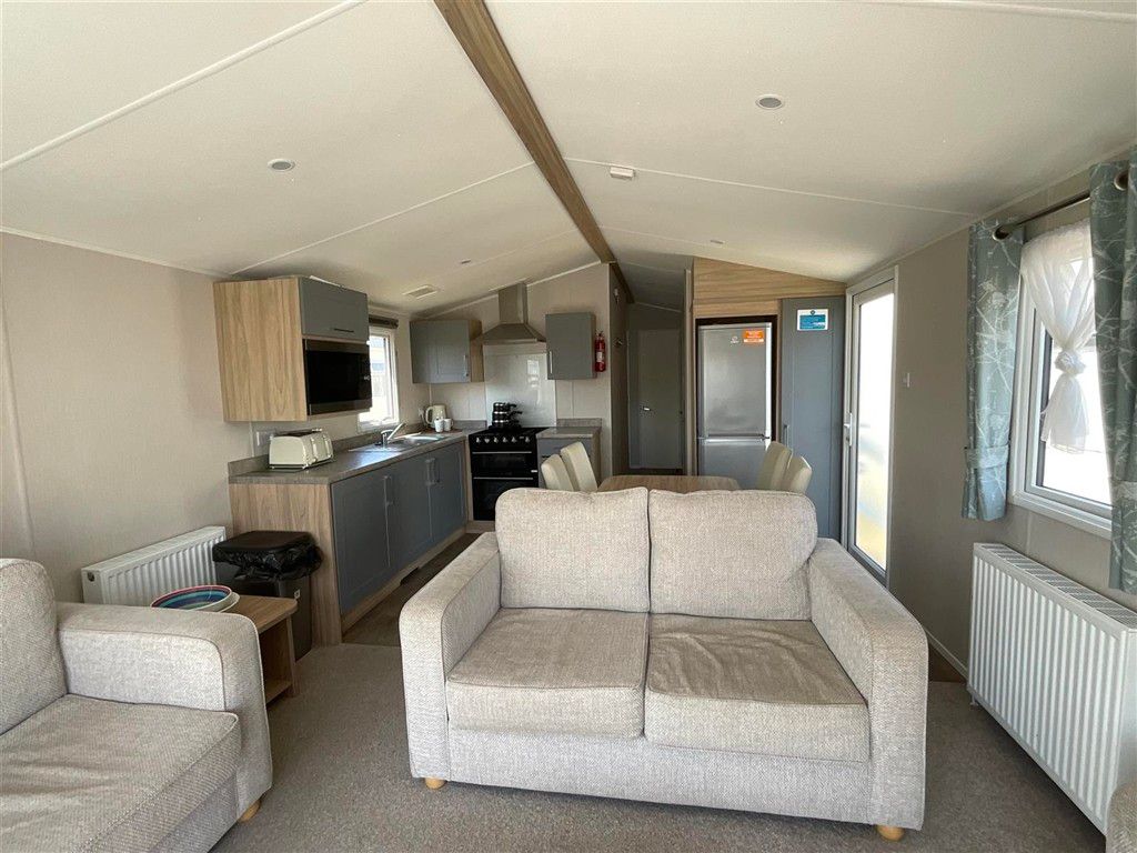 Property photo 3 of 8 Living Area